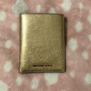 Michael Kors passport wallet OPEN TO OFFERS.